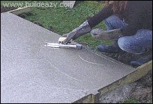 concrete slab floor being finished
