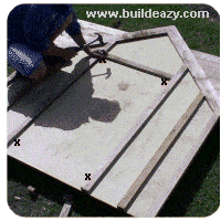 making the playhouse window and door openings