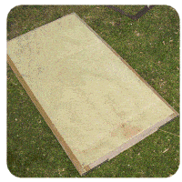 play cottage door with plywood panel