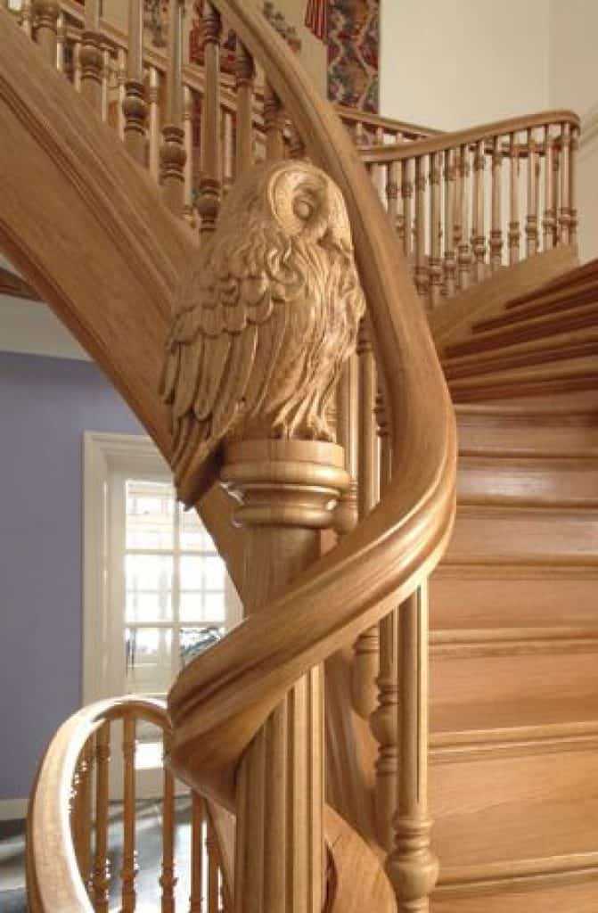 Traditional Wooden Staircase with Owlet Sculptures