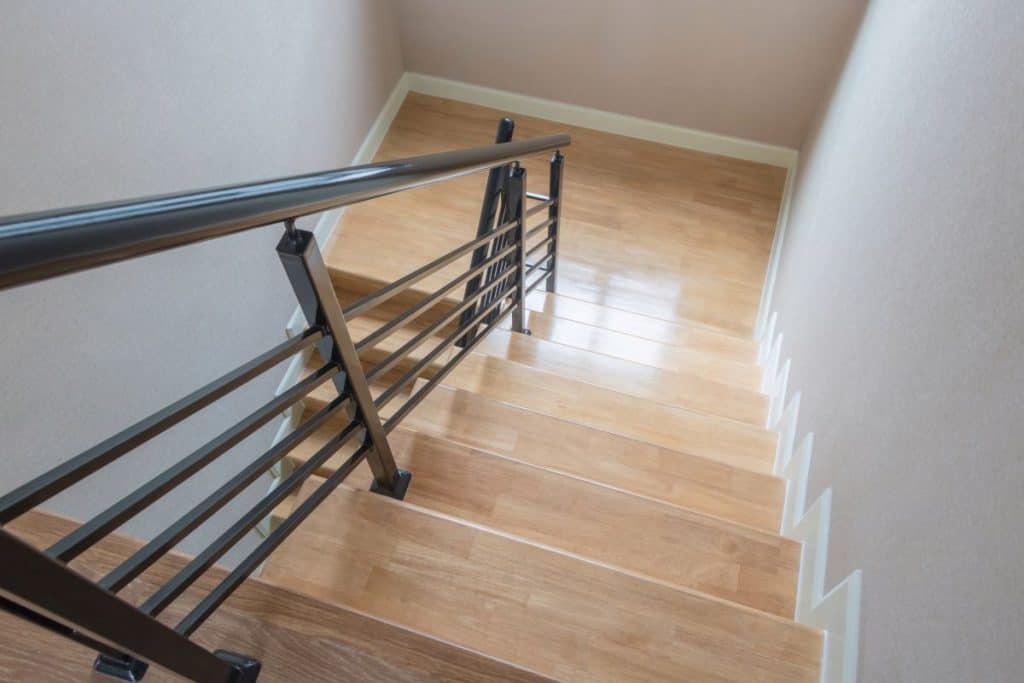 Wooden Stairs with Iron Handrail