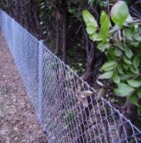 How to make a pipe and chain-link mesh fence